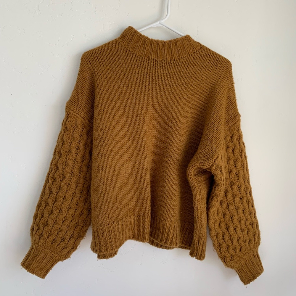 Gorgeous sweater with arm detail